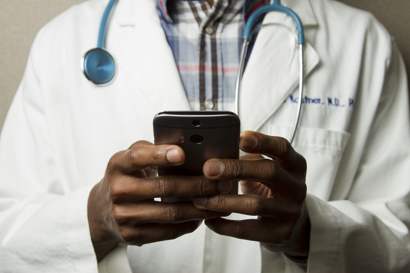 A pharmacist on the phone with a provider office